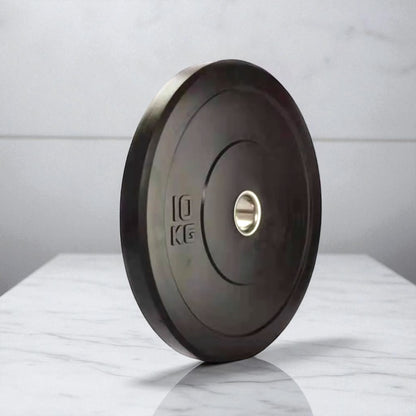 Black Rubber Olympic Weight Plates – Durable, Low-Bounce Plates for Strength Training.
