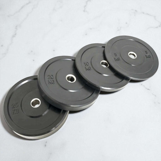 Black Rubber Olympic Weight Plates – Durable, Low-Bounce Plates for Strength Training.